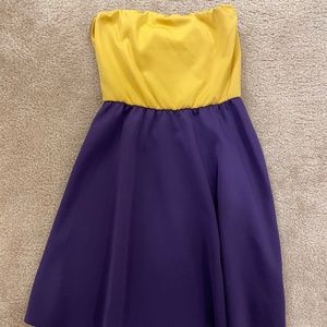Purple and gold/yellow strapless game day dress with bow. Size M